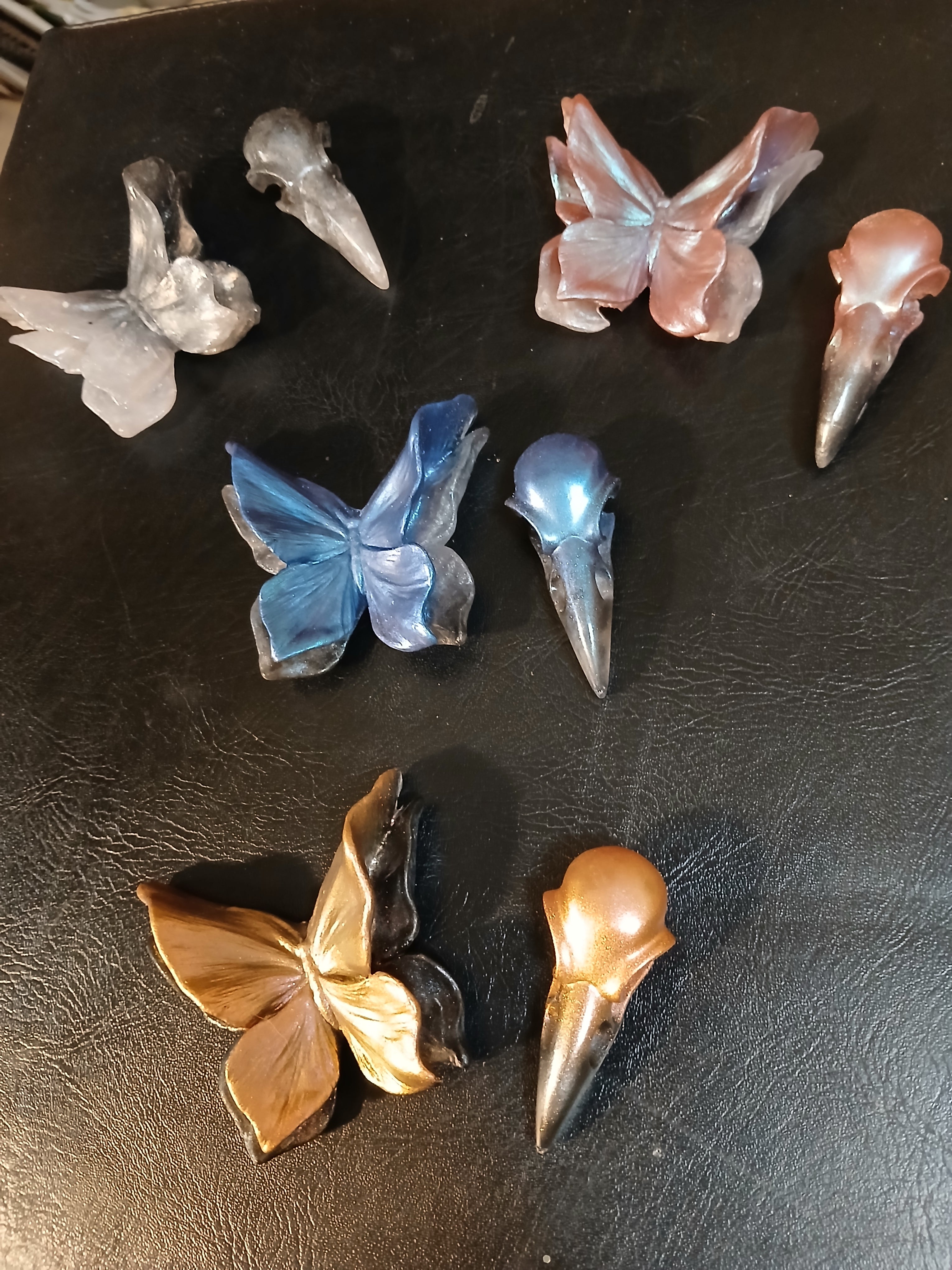 Butterfly and raven skull magnets